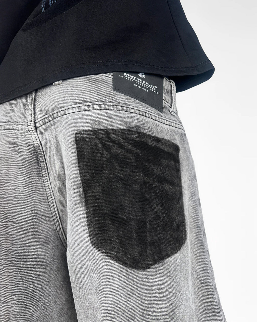 The Flex Symbol Grey Baggy Jeans