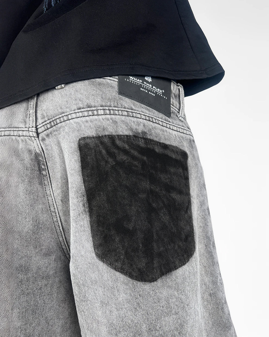 The Flex Symbol Grey Baggy Jeans